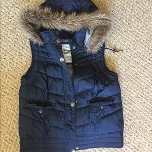 Blue puffer vest with hood and pockets